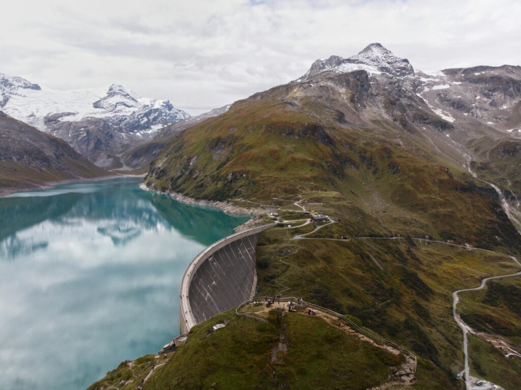 A stunning view of the Kaprun dam and lake surrounded by the Austrian Alps.