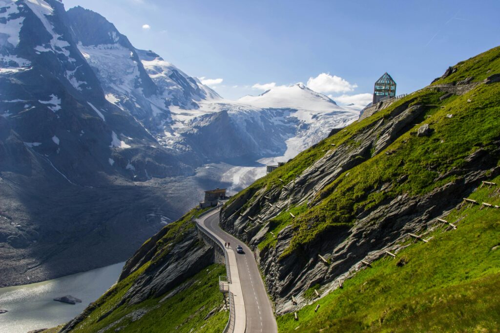 Beautiful view of a winding mountain road in Tyrol, Austria, perfect for adventure travel.