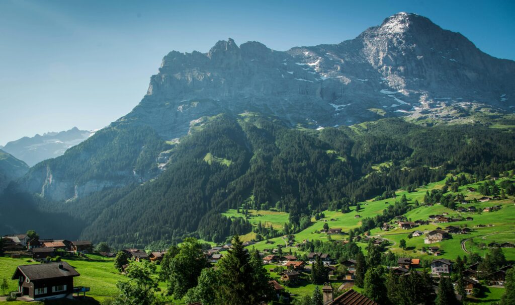 Breathtaking view of Grindelwald, Switzerland with majestic Swiss Alps and lush green valleys.