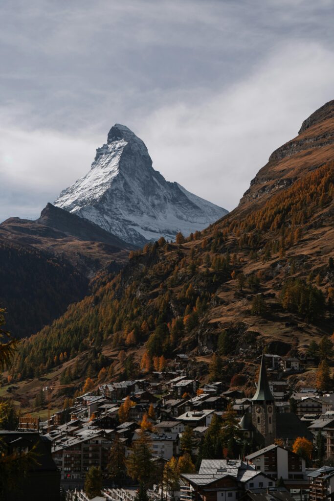Breathtaking autumn view of Matterhorn mountain towering over the village of Zermatt, Switzerland.